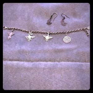 Charm bracelet with matching earring (never worn)